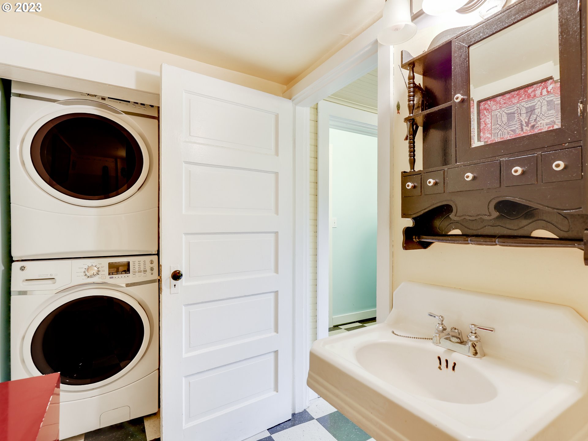 4936 Southeast 76th Avenue Portland, OR 97206 - Photo 34 of 47 a bathroom with a sink and a washer