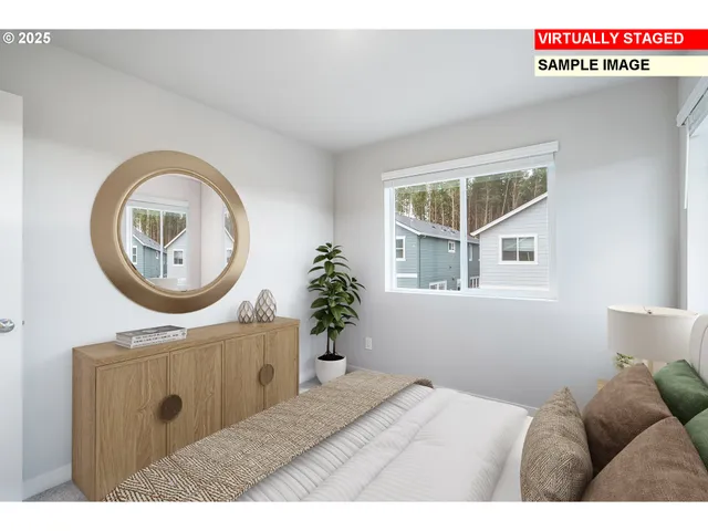 a living room with furniture a window and a mirror