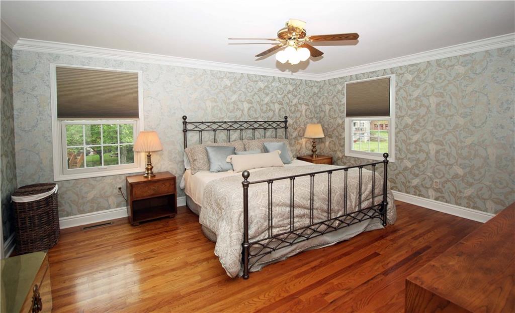 1790 Partridge Run Road Pittsburgh, PA 15241 - Photo 18 of 25 Master Bedroom with gleaming wood floors and a walk in closet