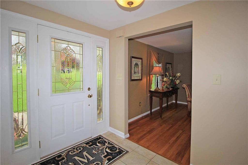 1790 Partridge Run Road Pittsburgh, PA 15241 - Photo 3 of 25 Light streams into the foyer from the leaded glass door.