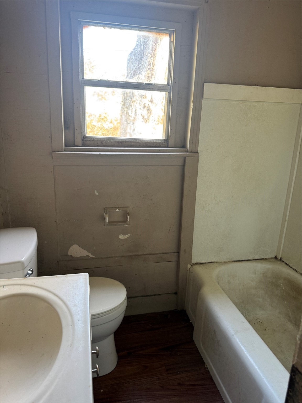 5325 Longmeadow Street Houston, TX 77033 - Photo 19 of 32 a bathroom with a toilet and a sink