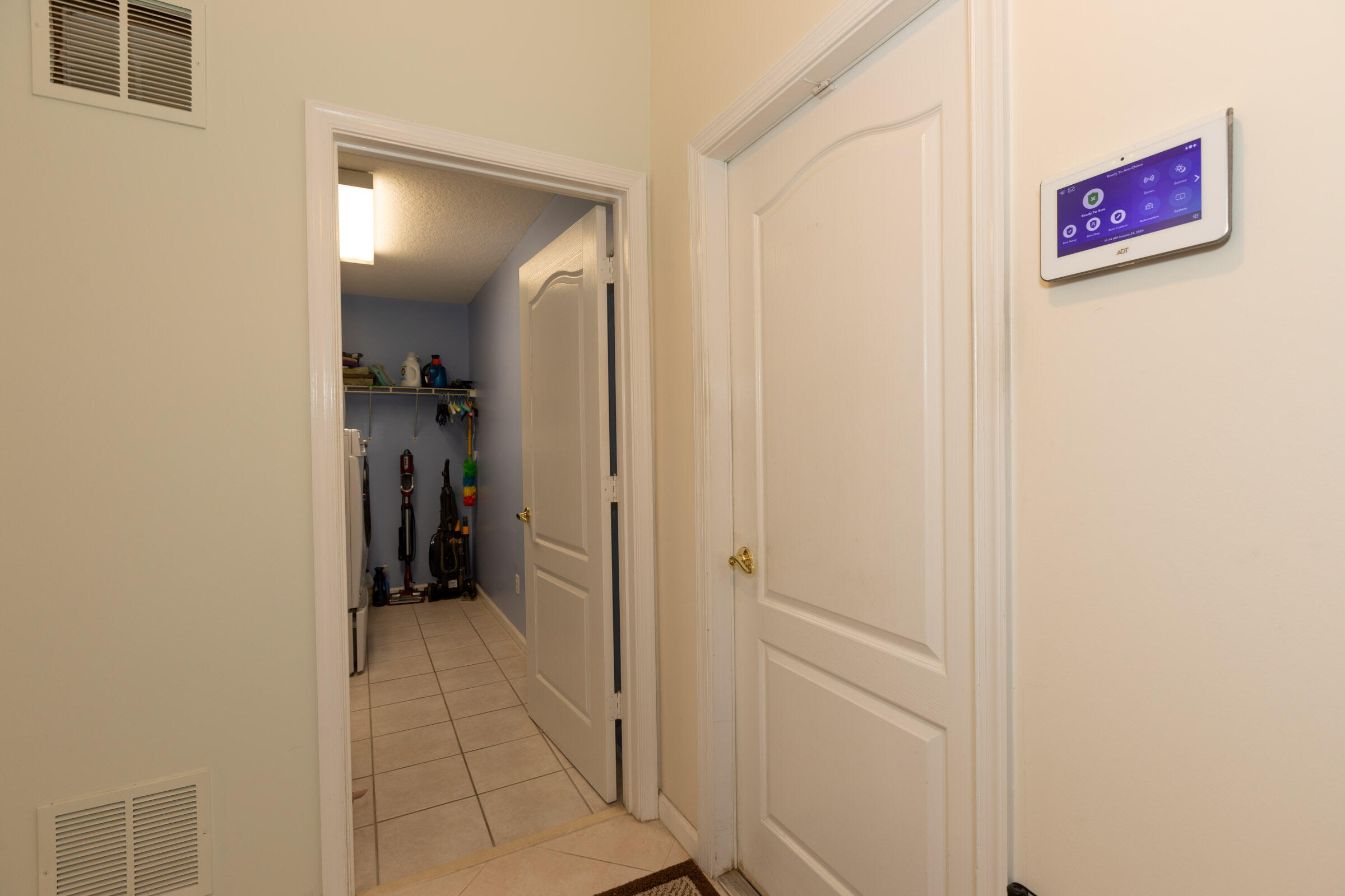 2031 Southeast Pyramid Road Port St. Lucie, FL 34952 - Photo 48 of 79 Laundry room entry