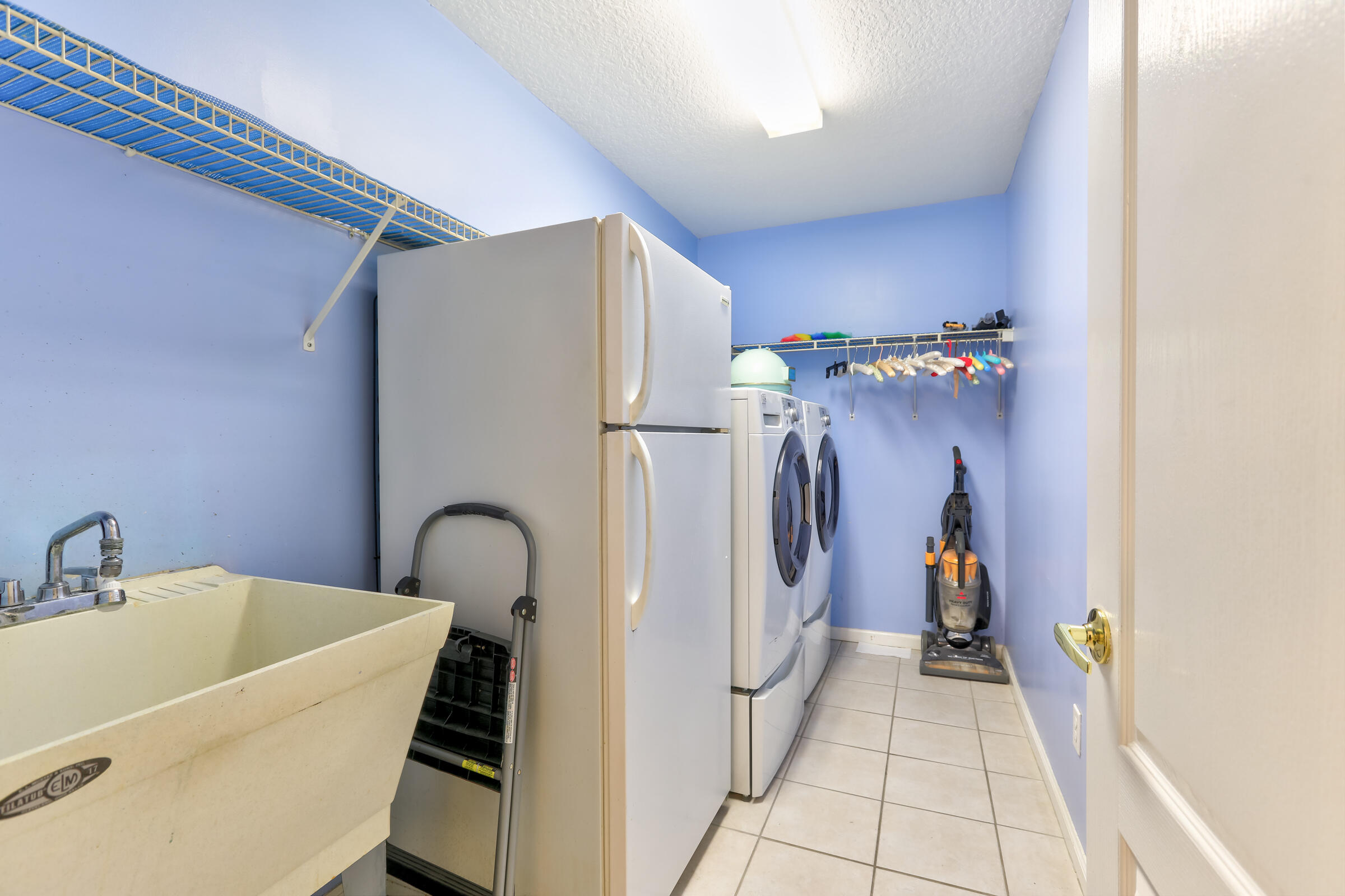 2031 Southeast Pyramid Road Port St. Lucie, FL 34952 - Photo 49 of 79 Laundry Room
