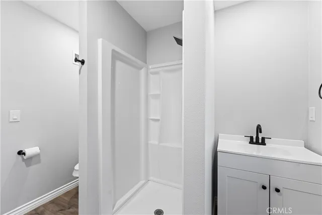 a bathroom with a sink and mirror