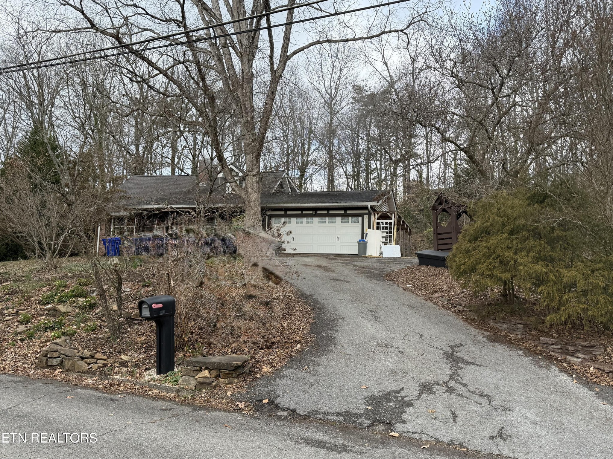 103 Baltimore Drive Oak Ridge, TN 37830 - Photo 1 of 45 a view of a house with a yard and garage