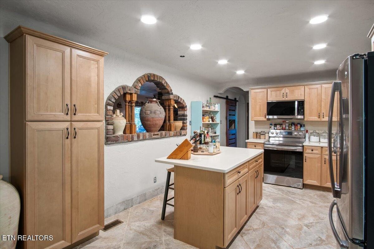 103 Baltimore Drive Oak Ridge, TN 37830 - Photo 11 of 45 a kitchen with a sink stove and refrigerator