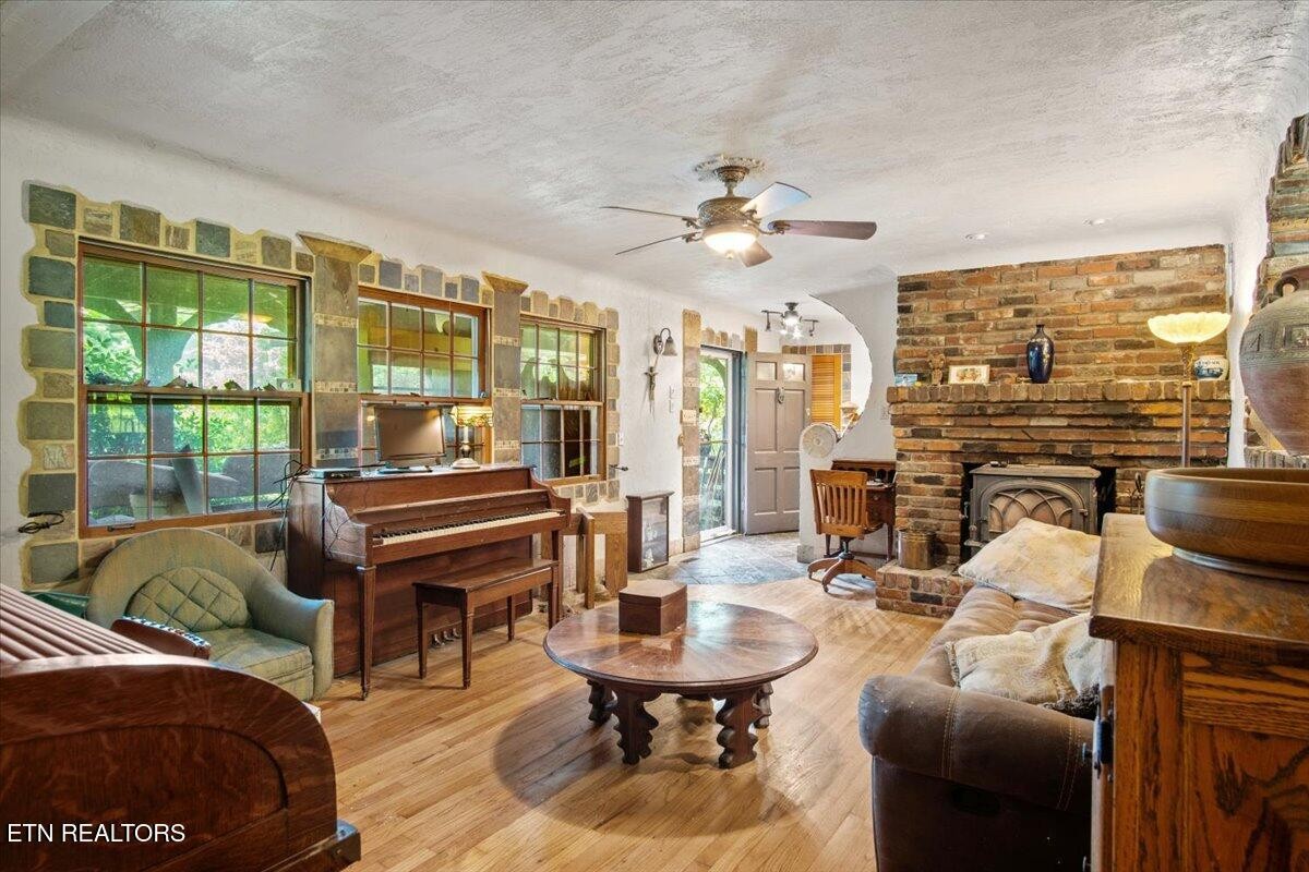 103 Baltimore Drive Oak Ridge, TN 37830 - Photo 9 of 45 a bedroom with furniture and a large window