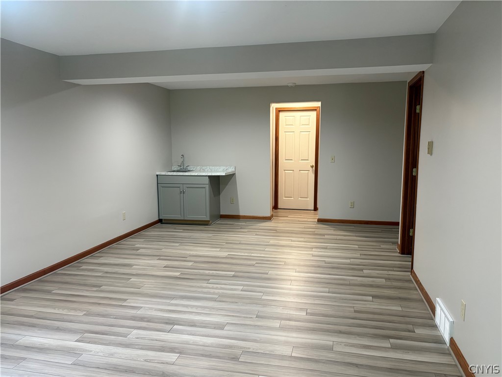 4627 Reliant Road Onondaga, NY 13078 - Photo 24 of 39 Wet bar. The door leads to very spacious unfinished basement storage