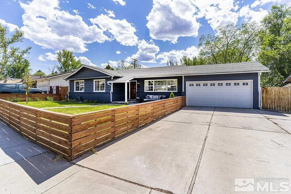 815 Lahontan Way Reno, NV 89509 - Photo 1 of 20 a view of a house with a large trees and a big yard