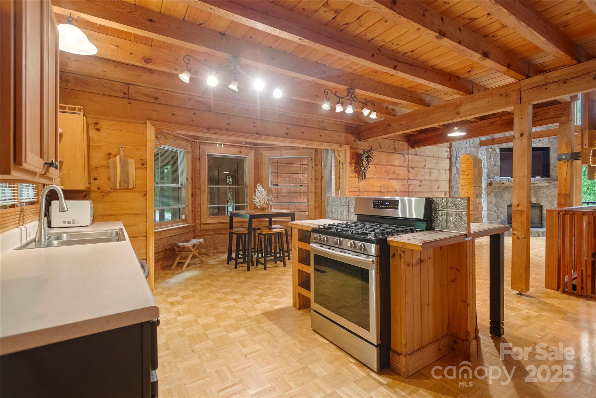 720 Potneck Road Salisbury, NC 28147 - Photo 15 of 48 a kitchen with stainless steel appliances granite countertop a stove and a refrigerator