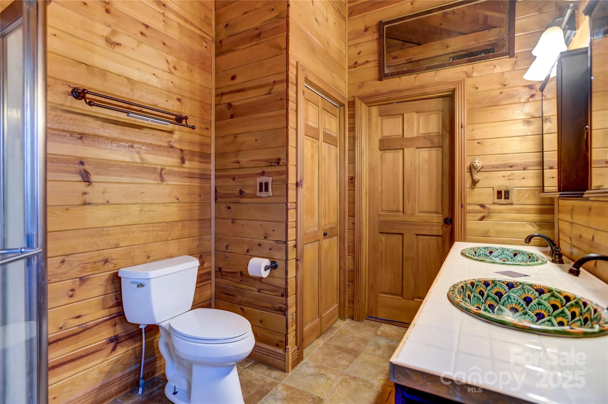 720 Potneck Road Salisbury, NC 28147 - Photo 24 of 48 a bathroom with a toilet and a shower