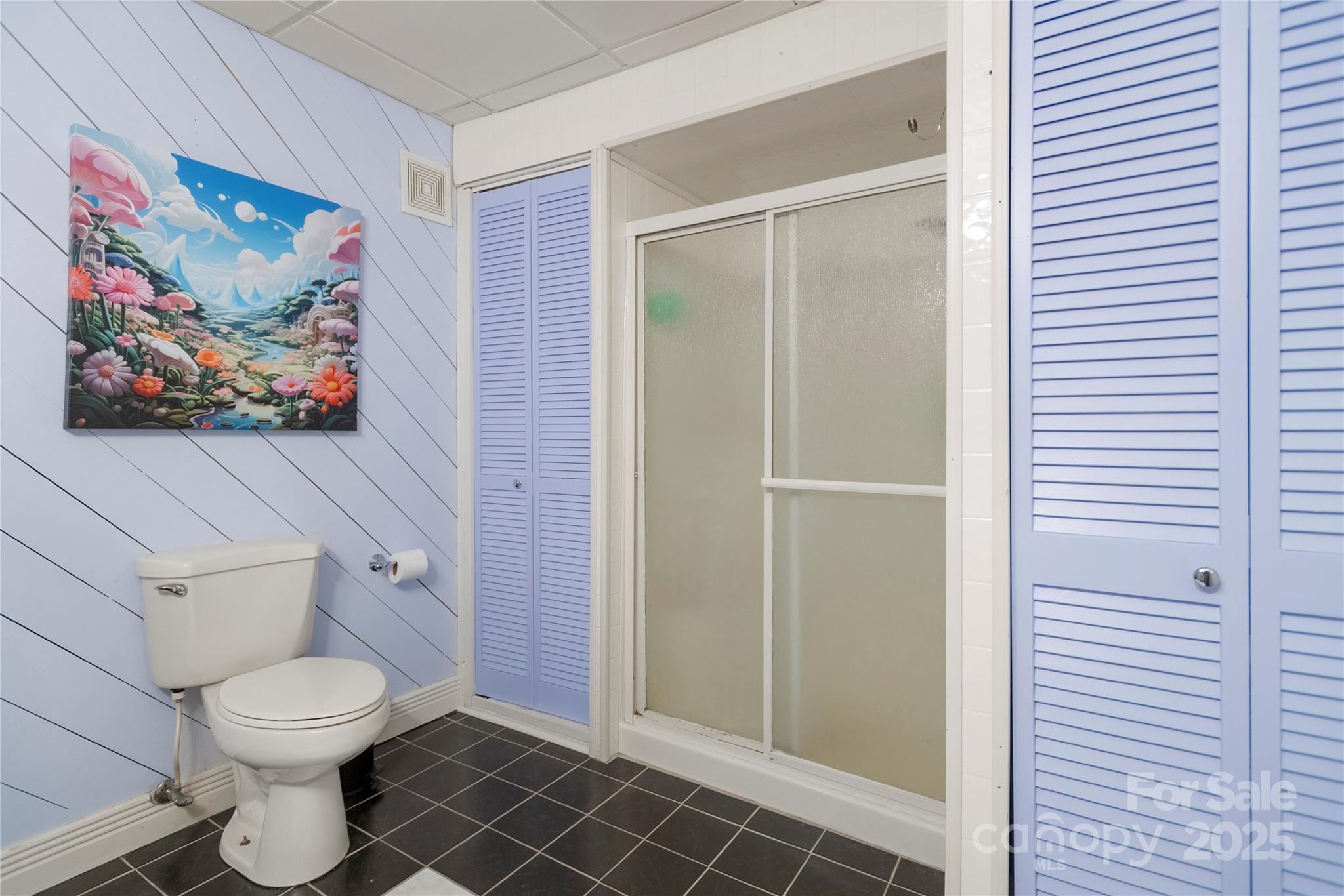 720 Potneck Road Salisbury, NC 28147 - Photo 29 of 48 a bathroom with a toilet and a shower