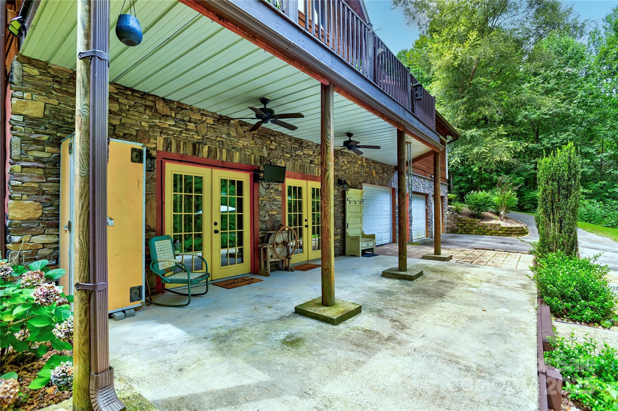 720 Potneck Road Salisbury, NC 28147 - Photo 33 of 48 a view of a house with backyard sitting area and garden