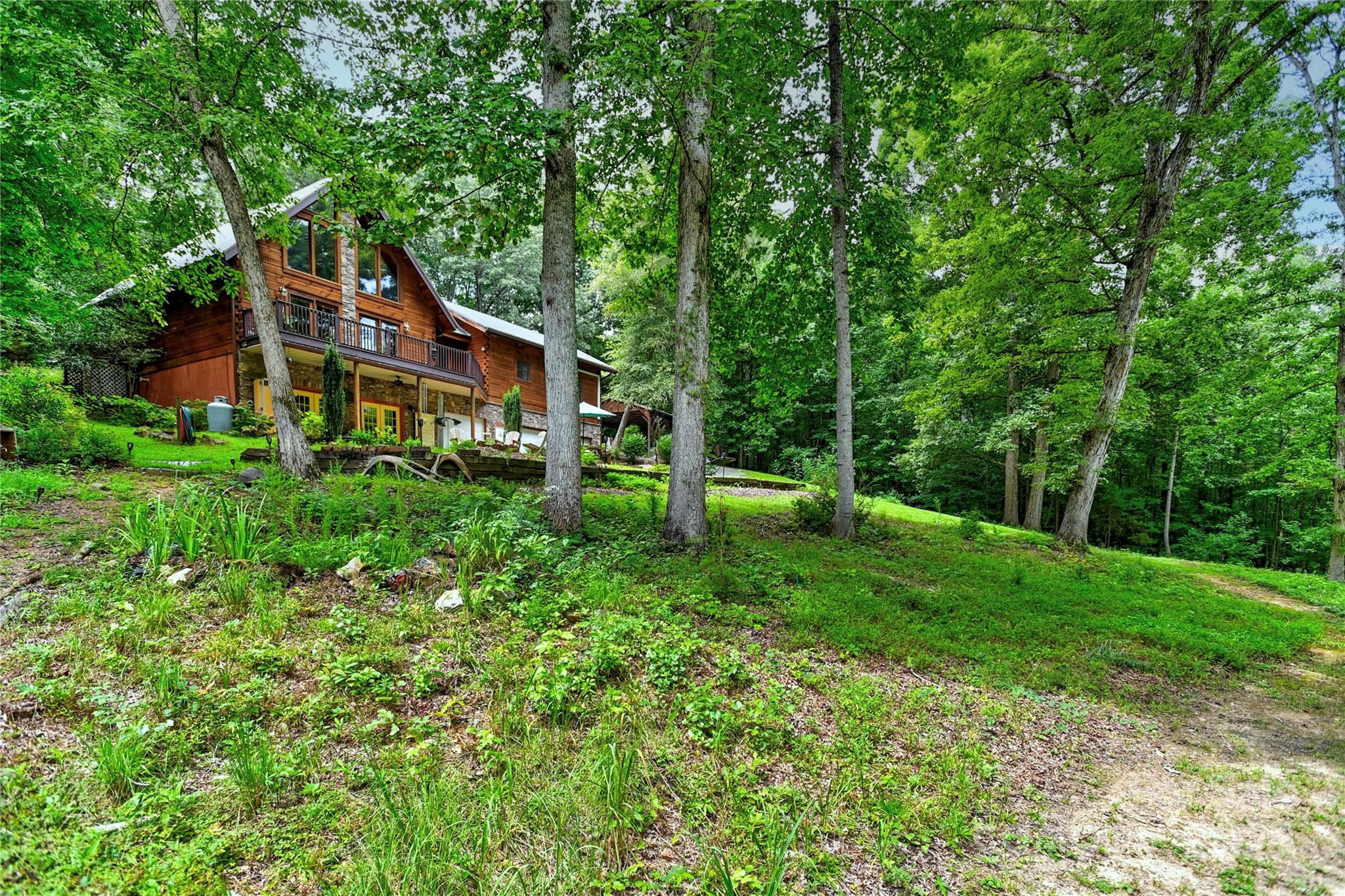 720 Potneck Road Salisbury, NC 28147 - Photo 38 of 48 a view of a house with a backyard
