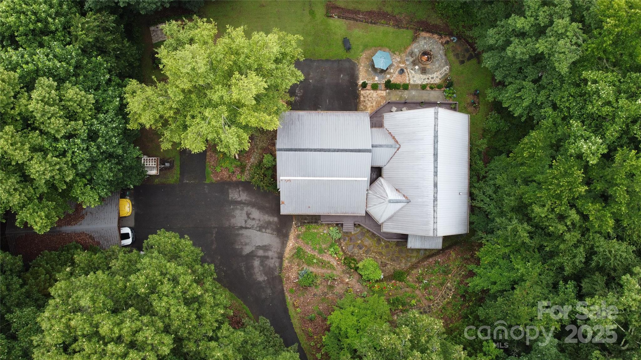 720 Potneck Road Salisbury, NC 28147 - Photo 44 of 48 an aerial view of a house with a yard and a large tree