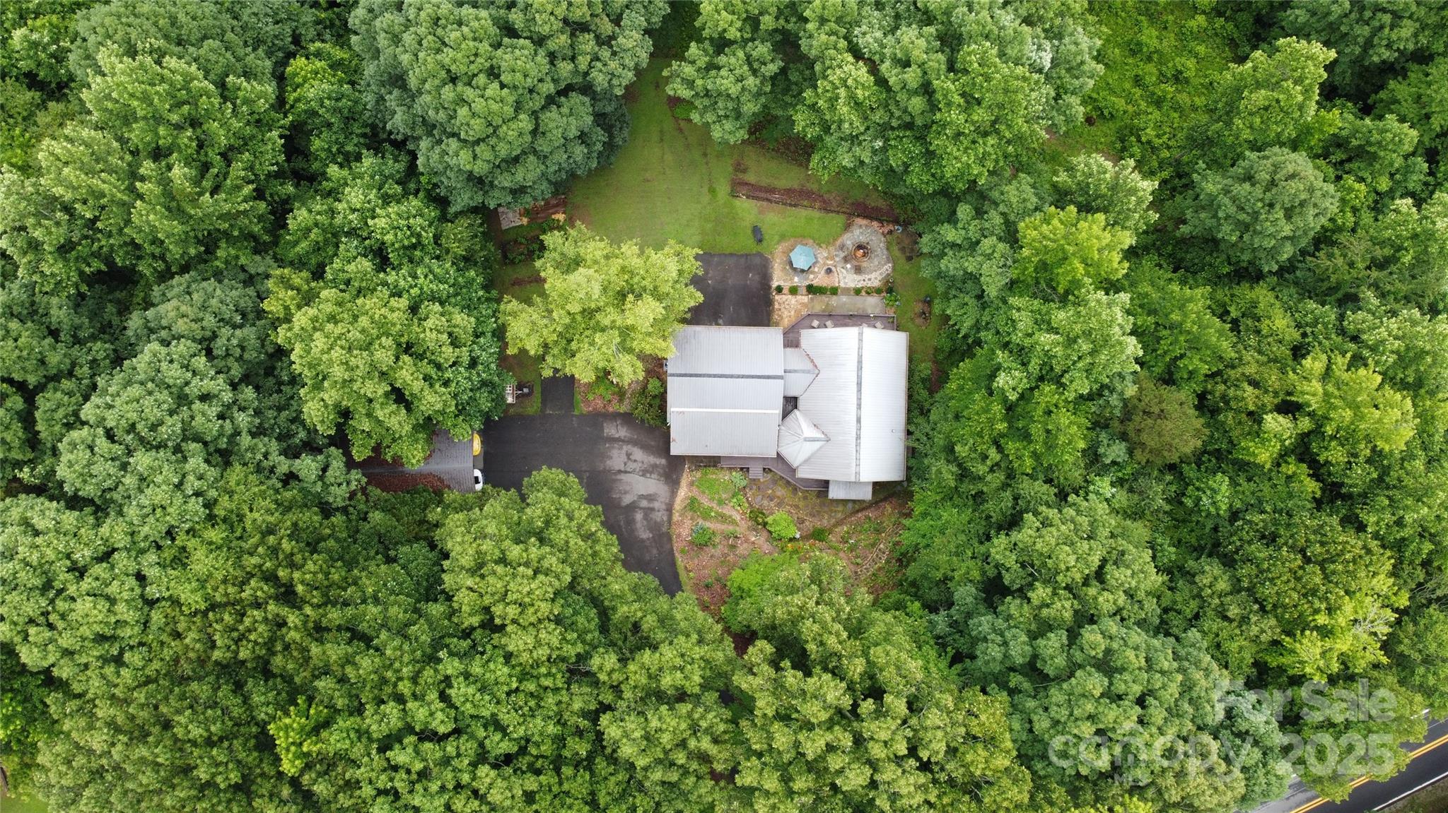 720 Potneck Road Salisbury, NC 28147 - Photo 45 of 48 an aerial view of a house with a yard