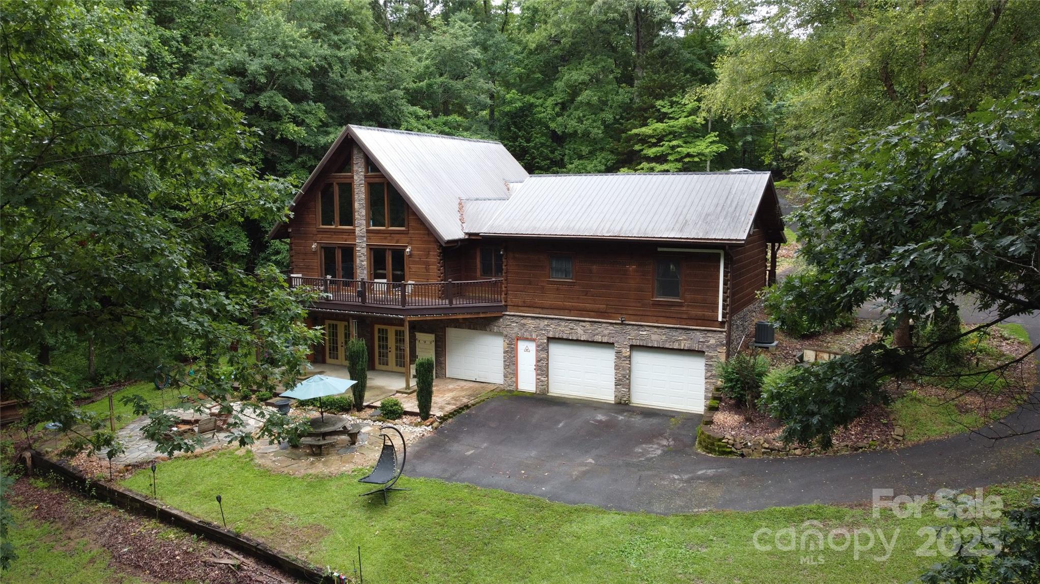 720 Potneck Road Salisbury, NC 28147 - Photo 46 of 48 a view of a house with backyard and sitting area