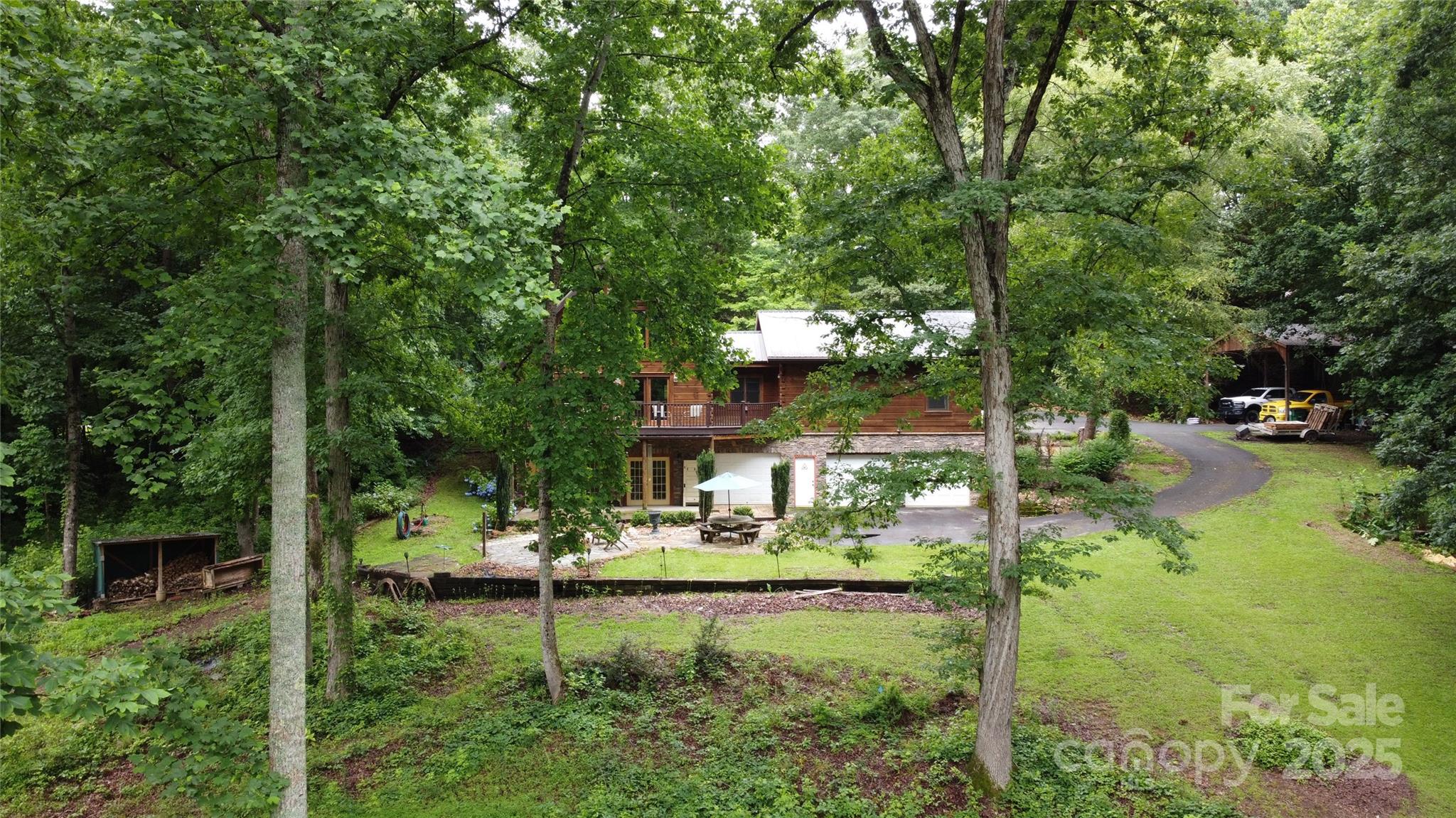 720 Potneck Road Salisbury, NC 28147 - Photo 48 of 48 a view of two chairs in a backyard of a house
