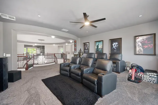 a view of cabinets and a window in closet