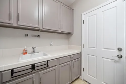 a view of a swimming pool with outdoor seating