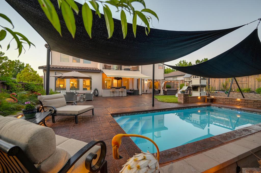 1721 Bella Circle Lincoln, CA 95648 - Photo 61 of 66 a view of a swimming pool with a patio