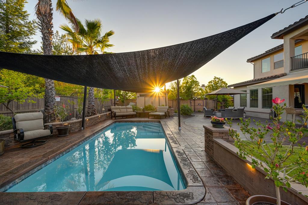 1721 Bella Circle Lincoln, CA 95648 - Photo 62 of 66 a view of a swimming pool with a patio