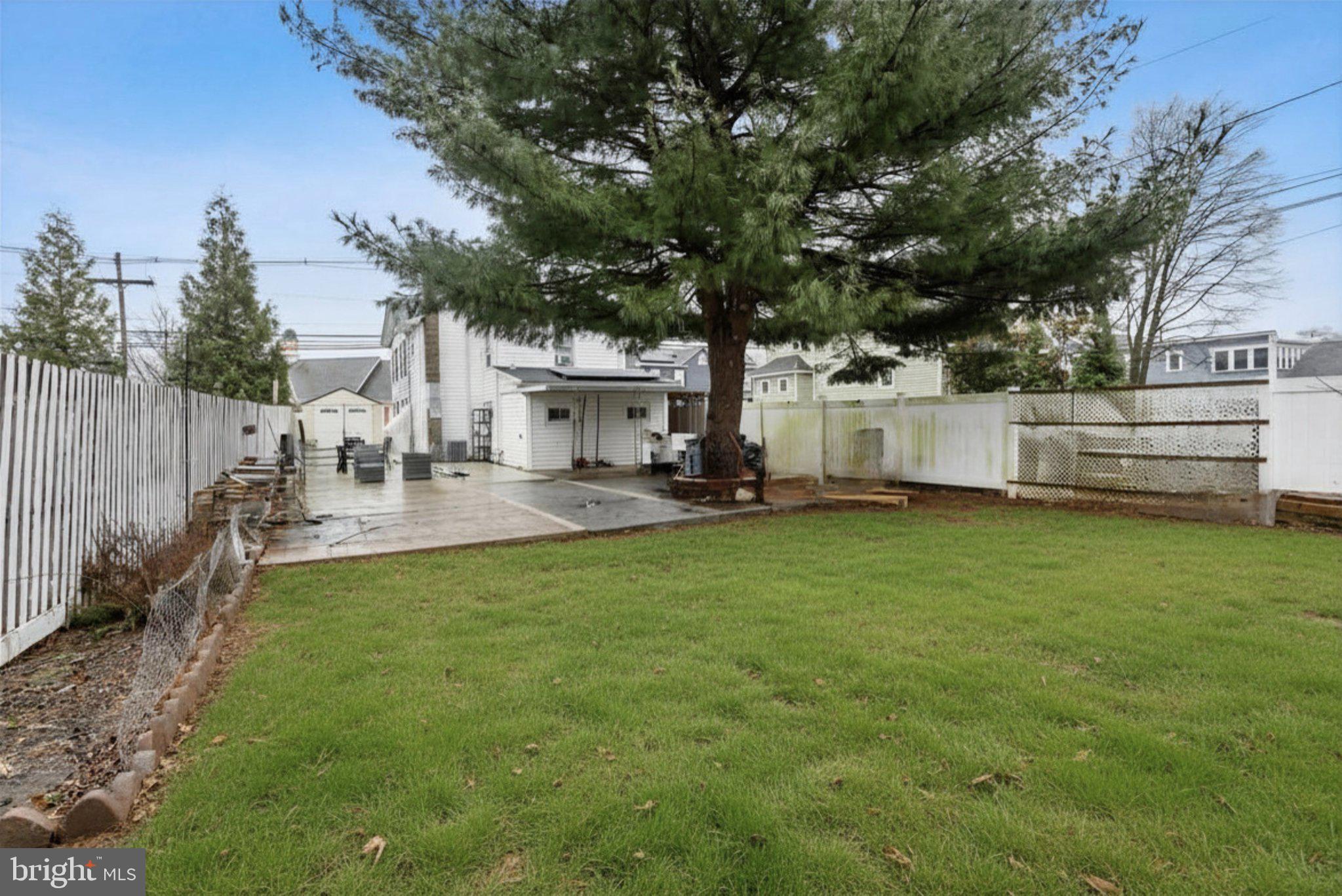 11 Main Street Englishtown, NJ 07726 - Photo 26 of 29 Spacious backyard with lush greenery.
