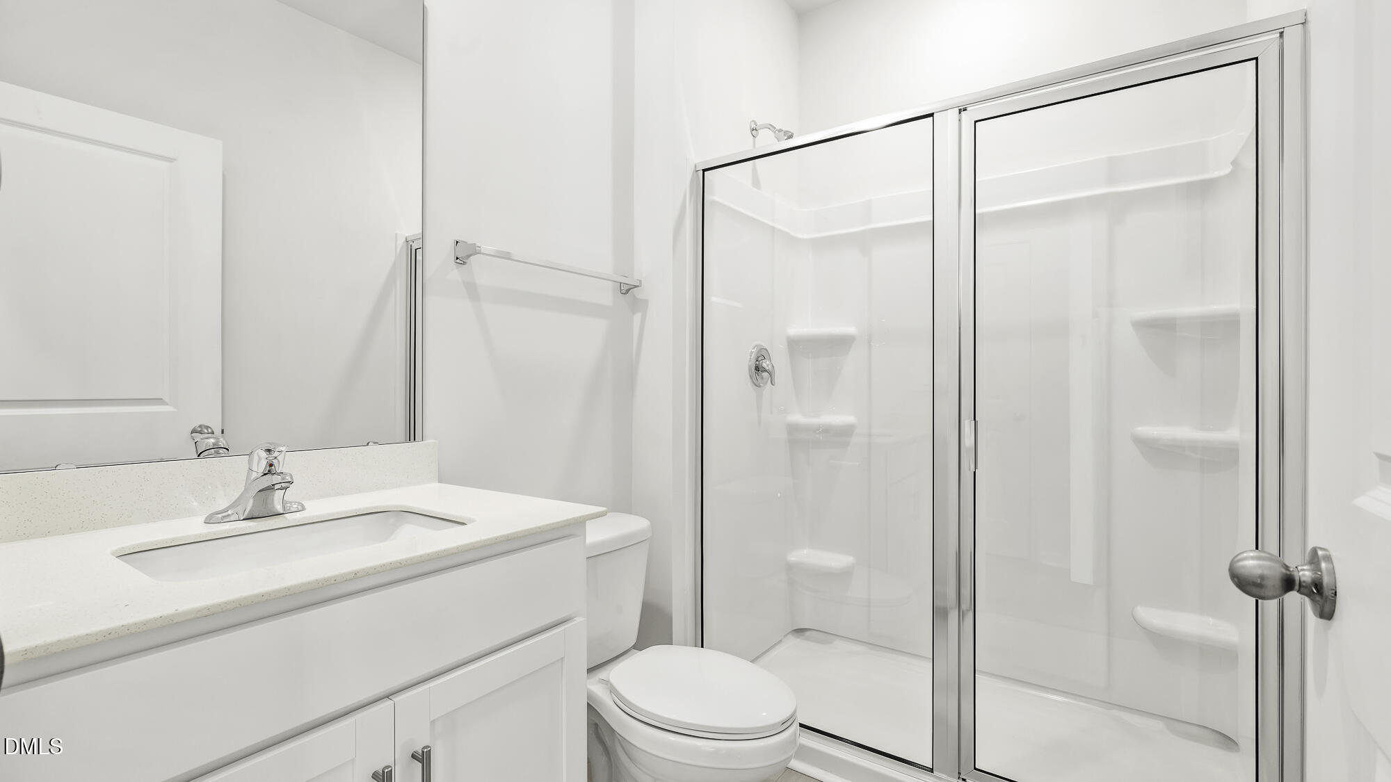 1376 Lansdowne Drive Mebane, NC 27302 - Photo 12 of 22 a bathroom with a sink toilet and shower