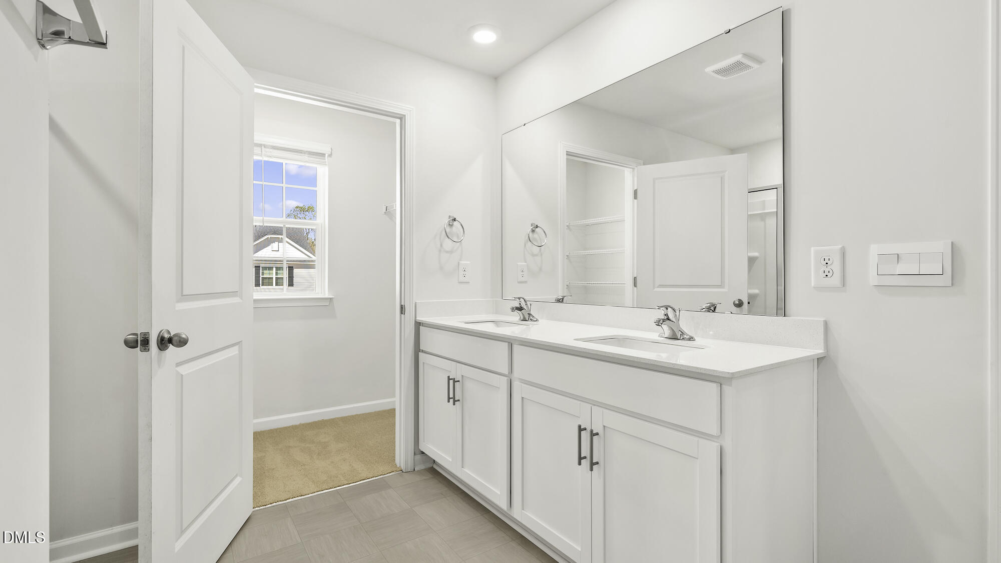 1376 Lansdowne Drive Mebane, NC 27302 - Photo 14 of 22 a bathroom with 2 sink a mirror and a shower