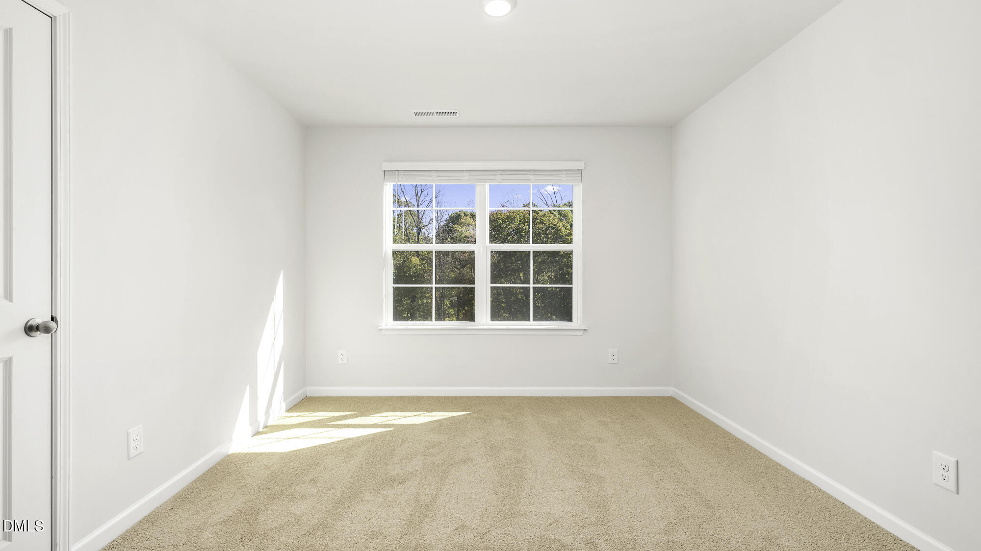 1376 Lansdowne Drive Mebane, NC 27302 - Photo 18 of 22 an empty room with a window