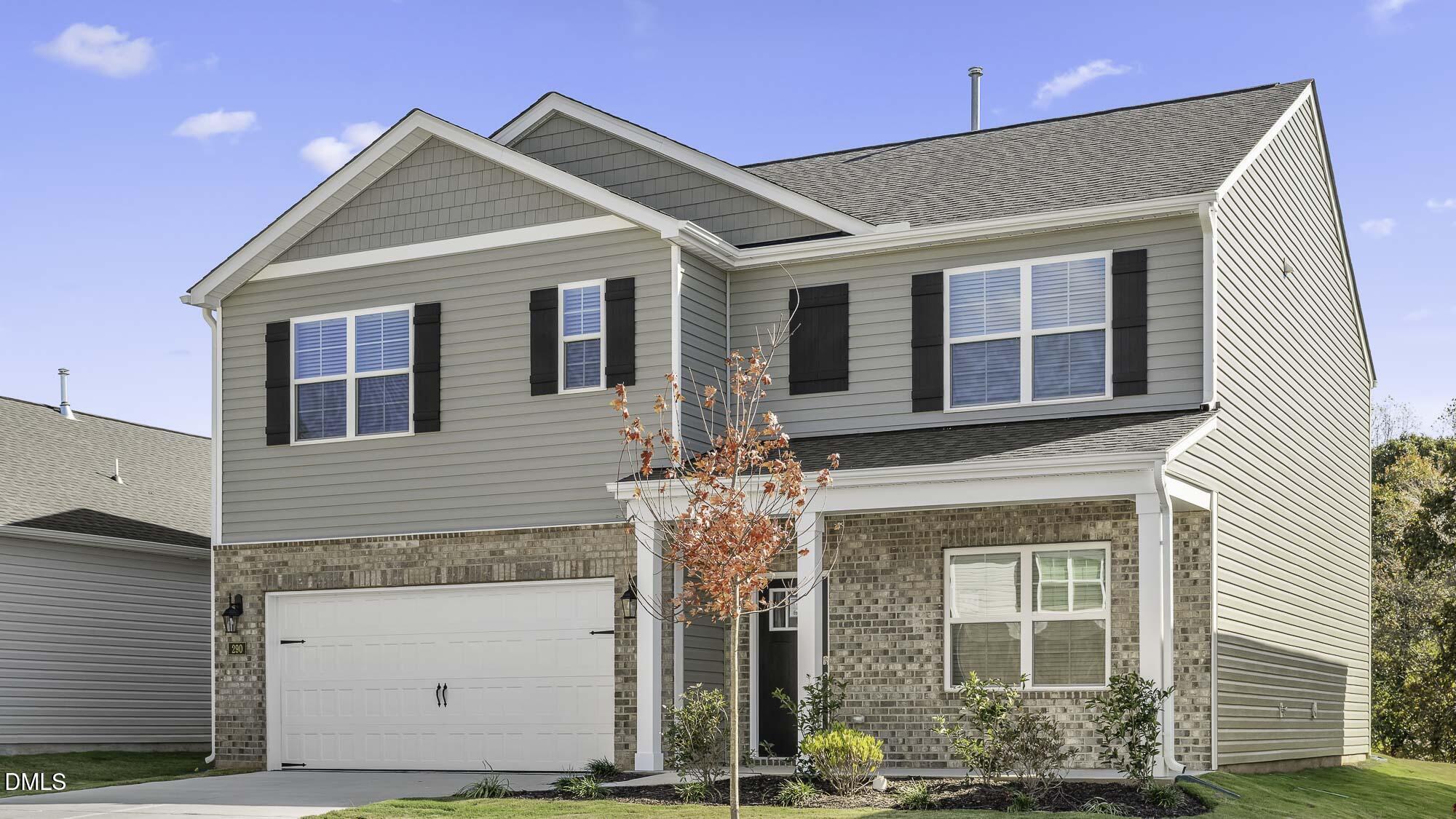 1376 Lansdowne Drive Mebane, NC 27302 - Photo 2 of 22 a front view of a house with a yard