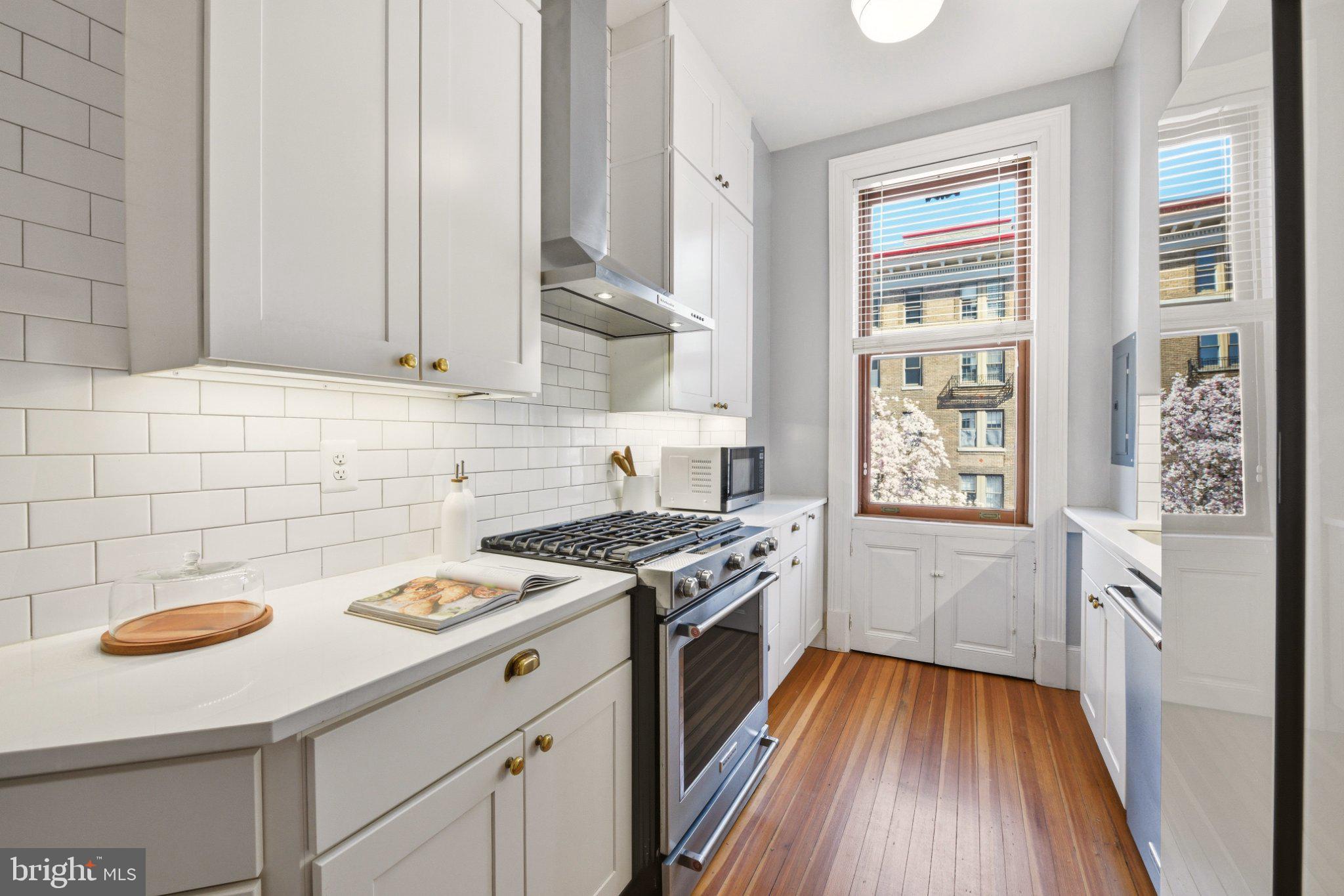2220 20th Street Northwest, Unit 33 Washington, DC 20009 - Photo 12 of 30 Bright and airy modern kitchen space.
