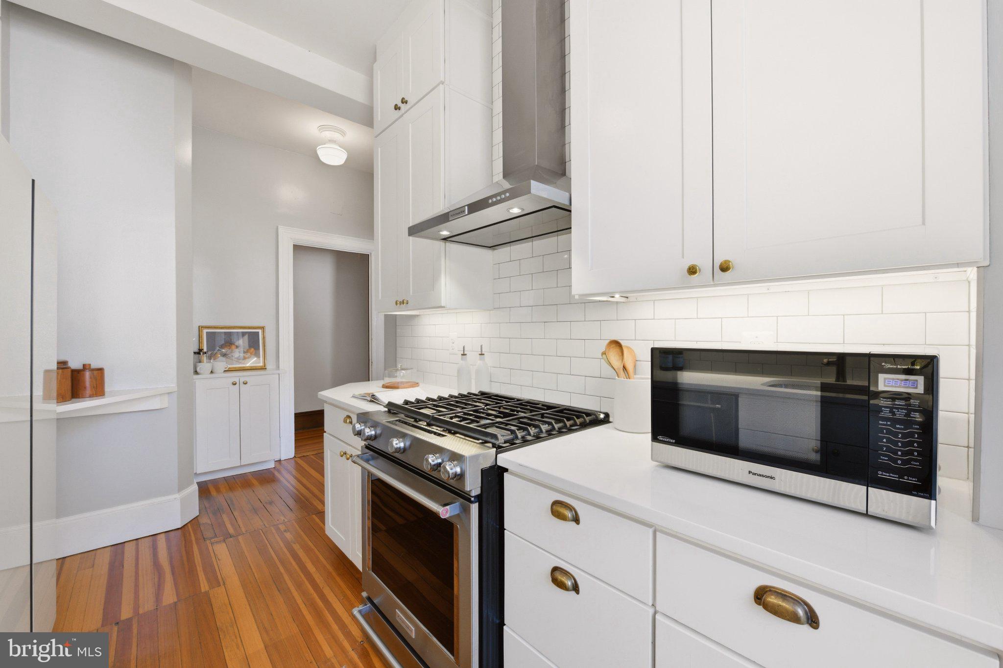 2220 20th Street Northwest, Unit 33 Washington, DC 20009 - Photo 13 of 30 Sleek kitchen with modern elegance.