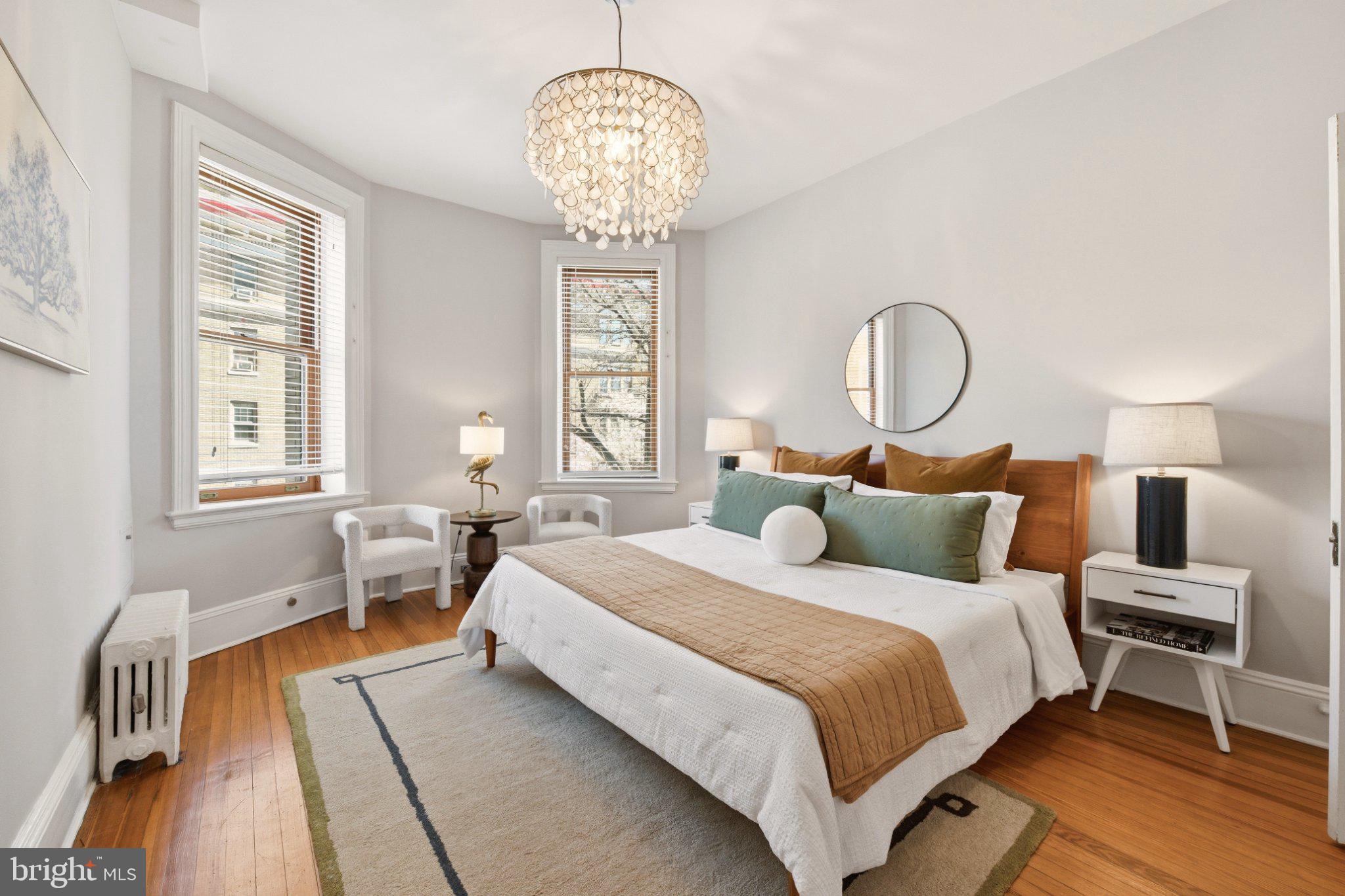 2220 20th Street Northwest, Unit 33 Washington, DC 20009 - Photo 19 of 30 Serene bedroom with elegant lighting.