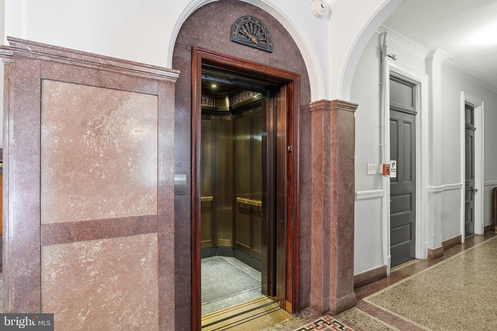 2220 20th Street Northwest, Unit 33 Washington, DC 20009 - Photo 27 of 30 Elegant elevator entrance in classic decor.