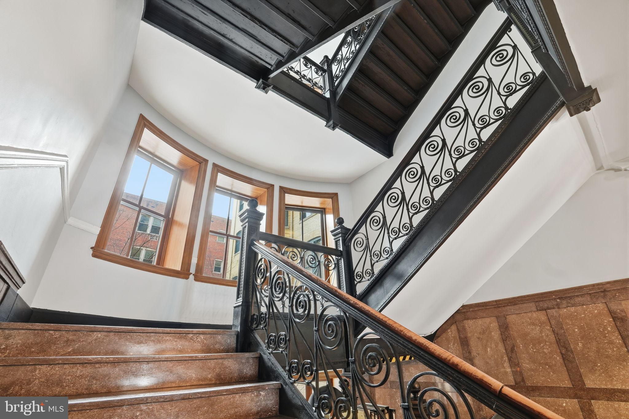 2220 20th Street Northwest, Unit 33 Washington, DC 20009 - Photo 29 of 30 Elegant staircase with intricate railings.