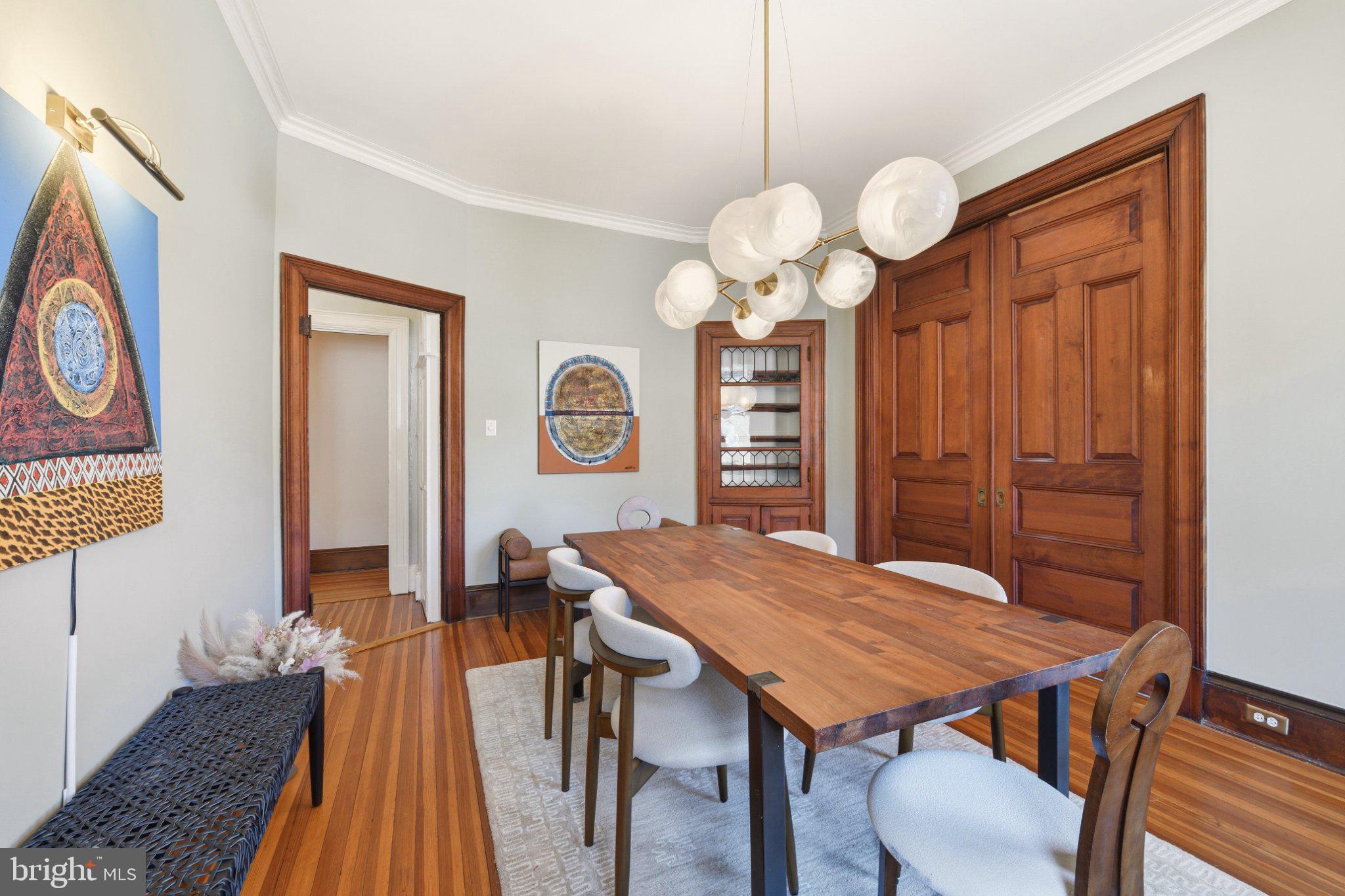 2220 20th Street Northwest, Unit 33 Washington, DC 20009 - Photo 9 of 30 Elegant dining space with rich wood accents.