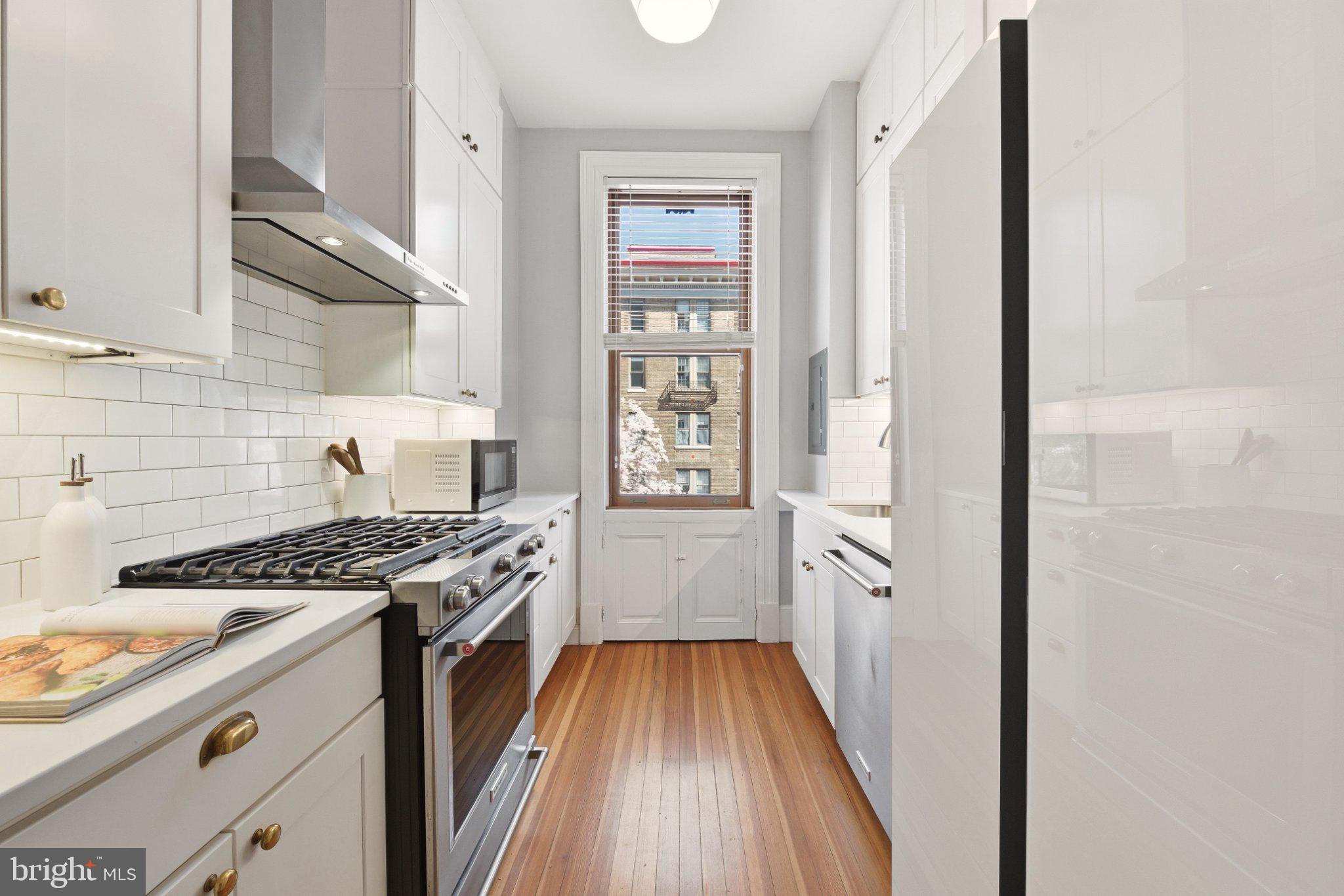 2220 20th Street Northwest, Unit 33 Washington, DC 20009 - Photo 10 of 30 Charming kitchen with modern elegance.