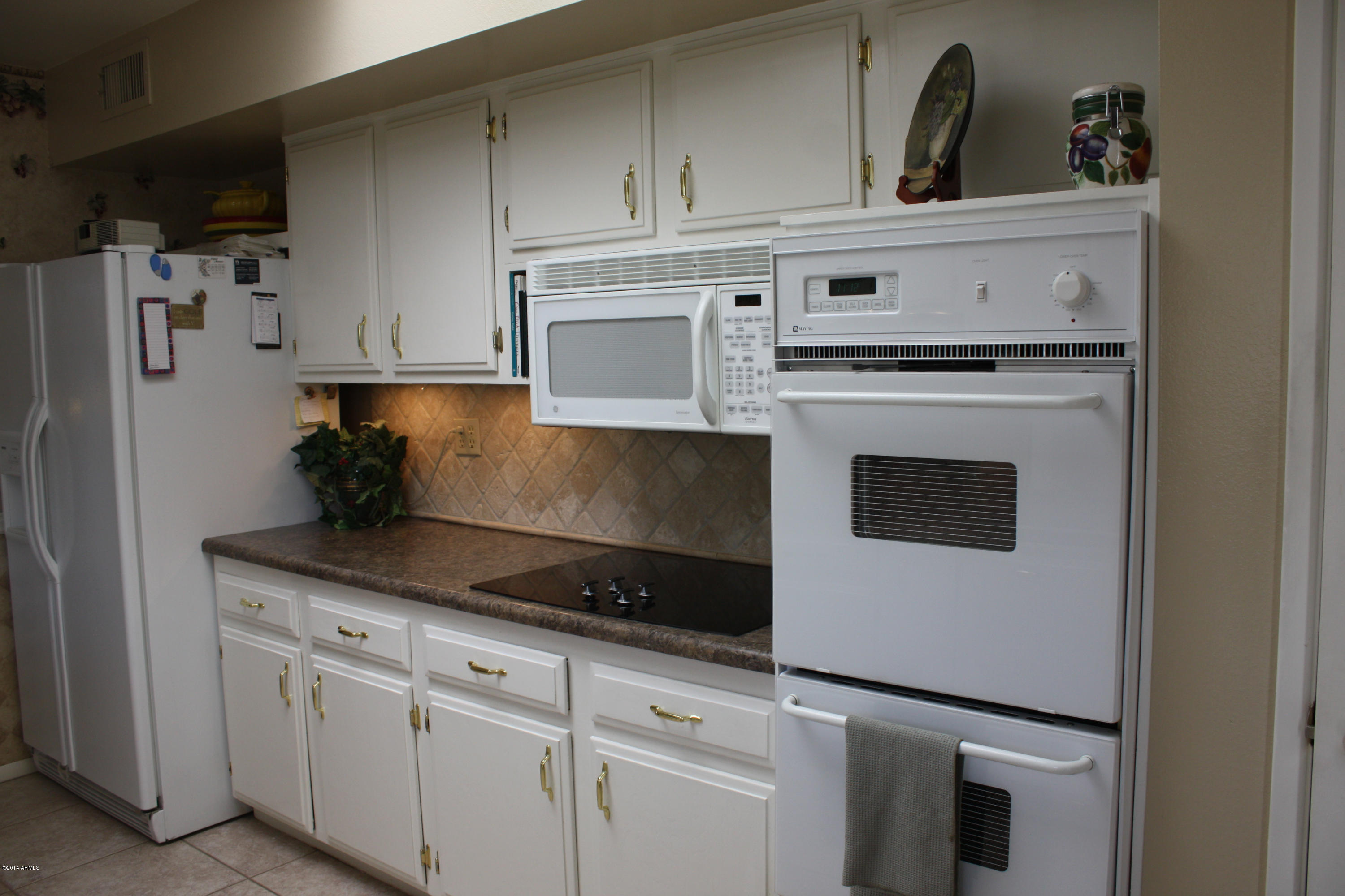 10726 West Hatcher Road Sun City, AZ 85351 - Photo 11 of 32 Under Counter Lighting