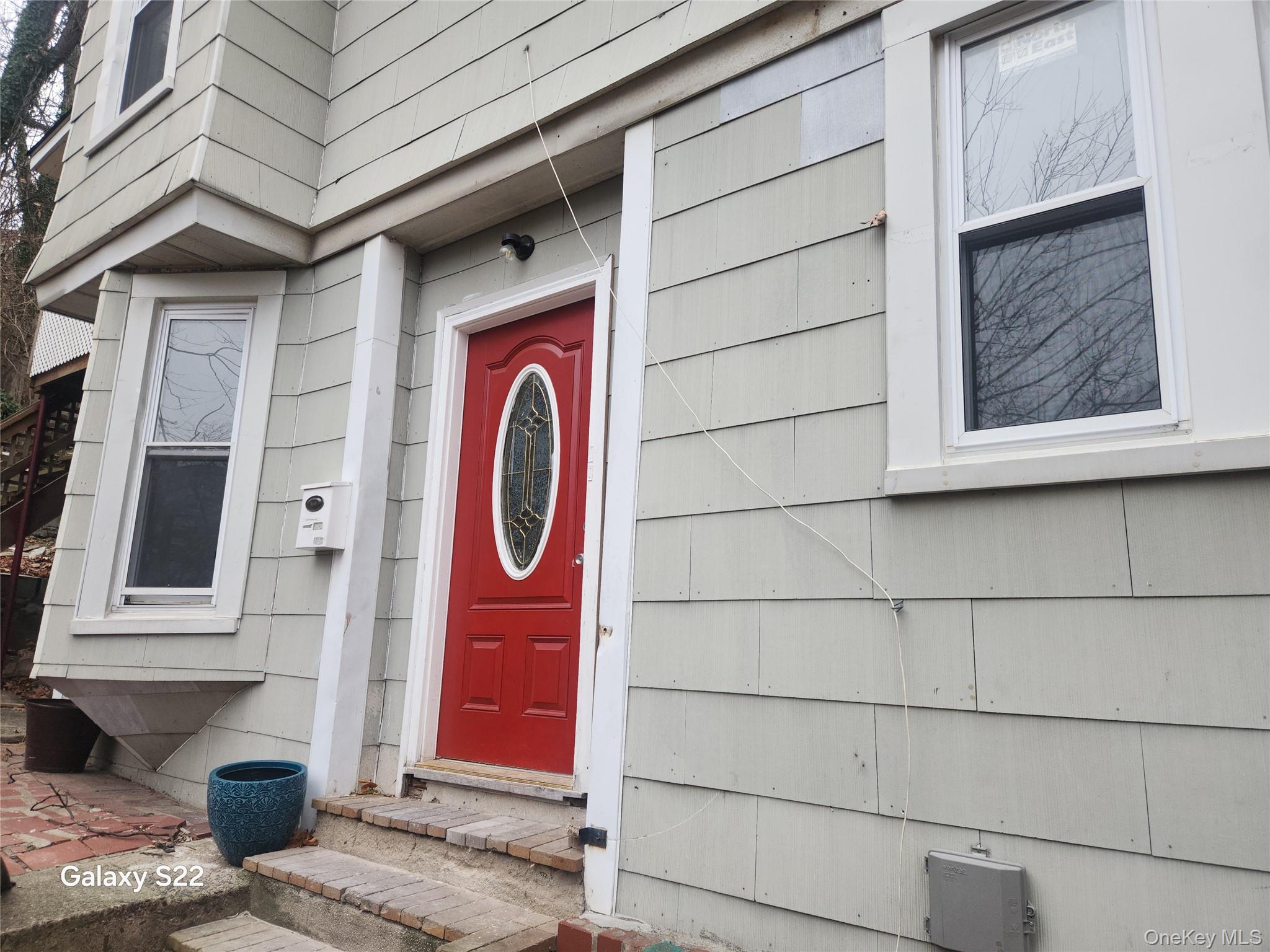 38 Cornell Avenue Yonkers, NY 10705 - Photo 2 of 11 a sign that is on the side of a building