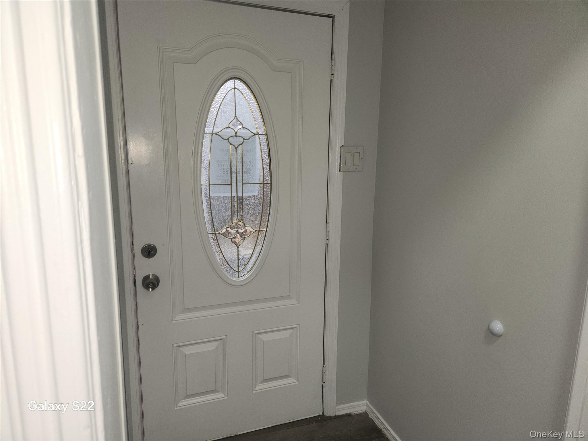 38 Cornell Avenue Yonkers, NY 10705 - Photo 9 of 11 a front view of a house with wooden floor and a door