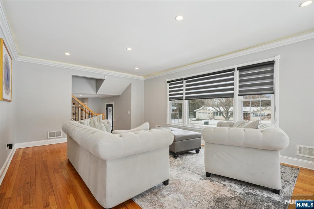 25 Nathan Way Wayne, NJ 07470 - Photo 8 of 36 a living room with furniture and a large window