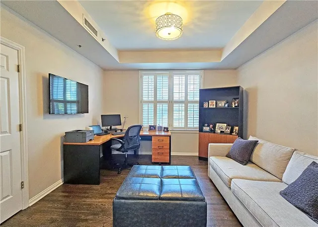 a bathroom with a sink mirror and vanity