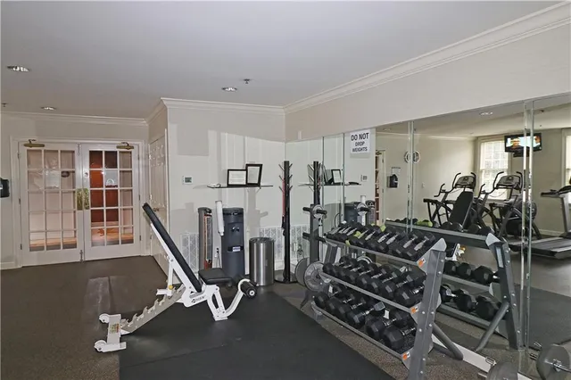 a view of a chair and tables in the backyard of the house