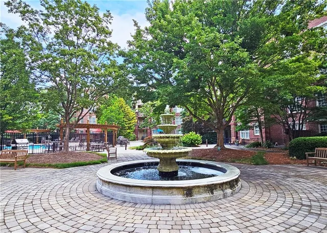a view of a swimming pool with a lounge chairs