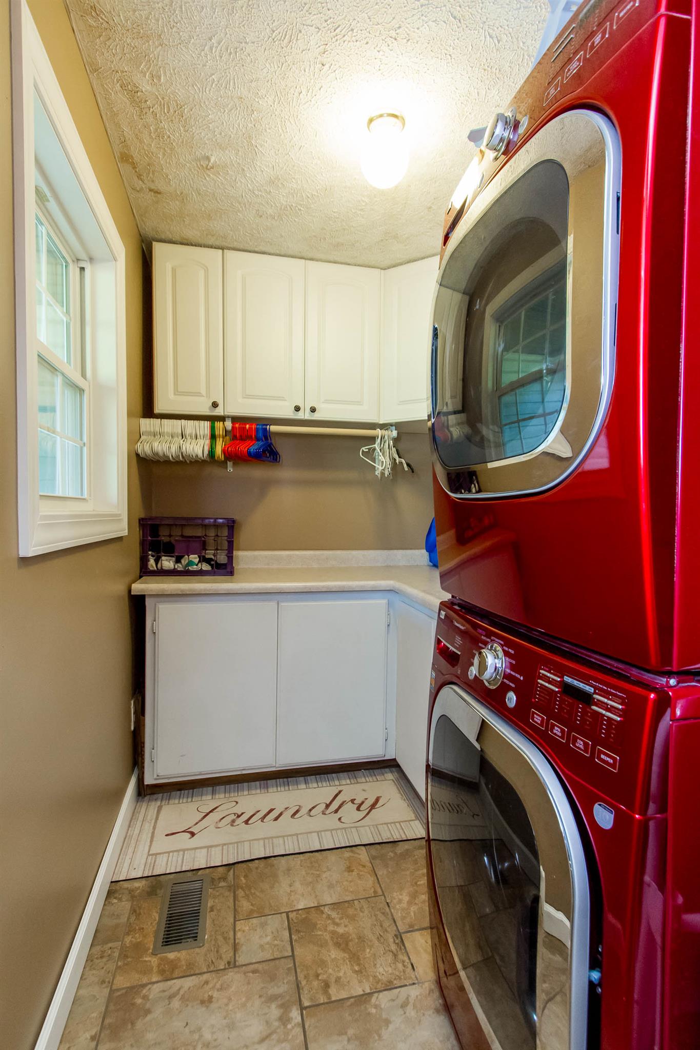 8404 Cedar Grove Road Cross Plains, TN 37049 - Photo 20 of 30 a utility room with dryer and washer