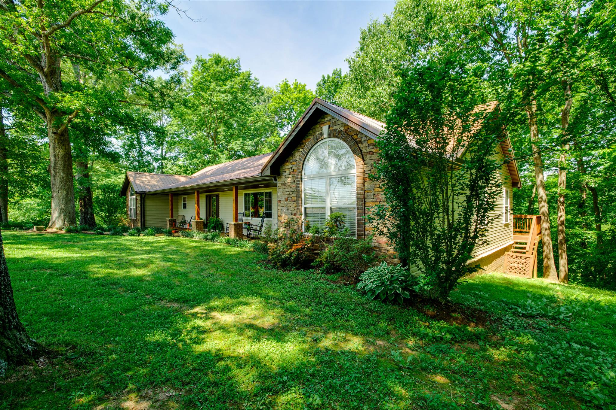 8404 Cedar Grove Road Cross Plains, TN 37049 - Photo 2 of 30 a front view of house with yard and green space