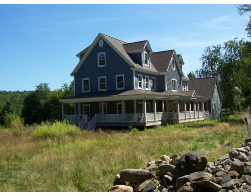 183 Monson Turnpike Road Petersham, MA 01366 - Photo 3 of 19 a view of a house with a garden and plants