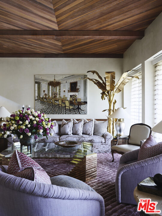 40471 Sand Dune Road Rancho Mirage, CA 92270 - Photo 12 of 42 a living room with furniture and flowers