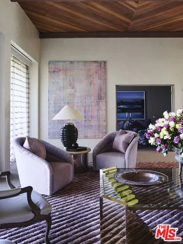 a living room with furniture and a couch